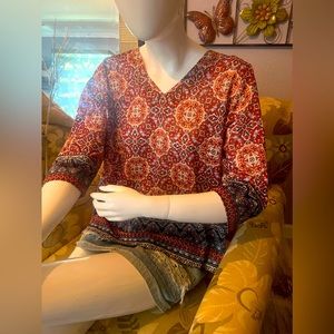 It’s a gorgeous blouse